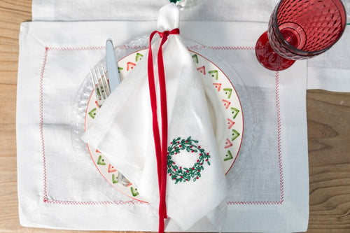 Festive White Linen Placemat with Red Bird Claw Design