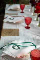 Festive White Linen Placemat with Red Bird Claw Design